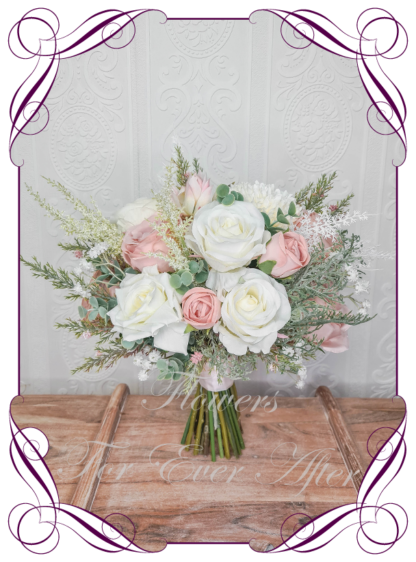 Artificial Bridal flowers in faux blush pink, dusty pink and white roses dahlia with gum natives. Silk Brides Bouquet posy, featuring faux flowers Australian native sage green gum leaves in a romantic elegant and unusual bridal style, classic white and dusty pink wedding flowers, native rustic wedding, boho flowers, traditional wedding bouquets. Made in Melbourne by Australia's Best Artificial Bridal Florist. Buy now Online. Worldwide Shipping available