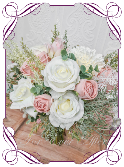 Artificial Bridal flowers in faux blush pink, dusty pink and white roses dahlia with gum natives. Silk Brides Bouquet posy, featuring faux flowers Australian native sage green gum leaves in a romantic elegant and unusual bridal style, classic white and dusty pink wedding flowers, native rustic wedding, boho flowers, traditional wedding bouquets. Made in Melbourne by Australia's Best Artificial Bridal Florist. Buy now Online. Worldwide Shipping available