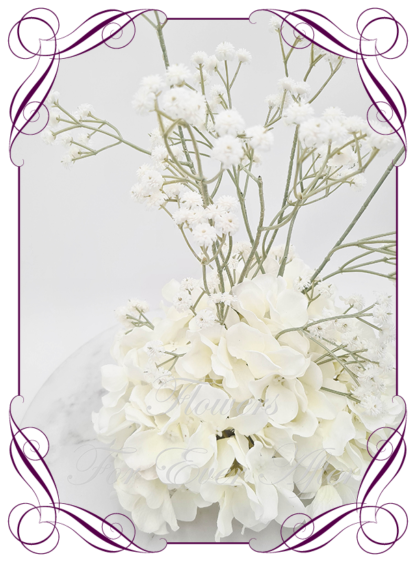 Silk faux ivory, white table centrepiece decoration flowers. Wedding table florals. Shower table decorations. Luxe romantic wedding table centrepiece with roses, babys's breath, hydrangea. Affordable table decoration flowers. Made in Australia. Buy online. Shipping world wide.