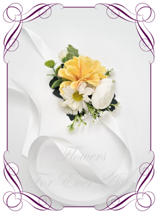Faux wedding flowers for ladies corsage. Featuring silk flowers in yellow, and white. Made in Melbourne Australia