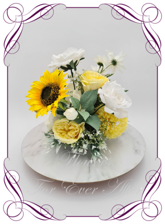 Silk faux ivory, white, yellow, sunset, sunflower table centrepiece decoration flowers. Wedding table florals. Shower table decorations. Luxe romantic wedding table centrepiece with sunflowers, roses, babys's breath, daisy, daisies, poppies, hydrangea. Affordable table decoration flowers. Made in Australia. Buy online. Shipping world wide.