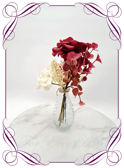 Silk artificial cream and burgundy table centrepiece decoration flowers. Wedding table florals. Shower table decorations. Luxe rustic romantic wedding table centrepiece with roses, babys's breath, berries, and hydrangea. Affordable table decoration flowers. Made in Australia. Buy online. Shipping world wide.