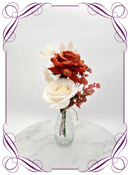 Silk faux rust, burnt orange, cream and mustard table centrepiece decoration flowers. Wedding table florals. Shower table decorations. Luxe rustic romantic wedding table centrepiece with roses, babys's breath, orchids, hydrangea. Affordable table decoration flowers. Made in Australia. Buy online. Shipping world wide.