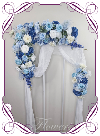 Silk Wedding ceremony arbour flowers package in artificial white and blue arbor florals. Décor for wedding ceremony backdrop decoration. Faux Roses, hydrangea, and delphinium. Buy online now. Shipping world wide. Cheap wedding arbor decoration ideas.