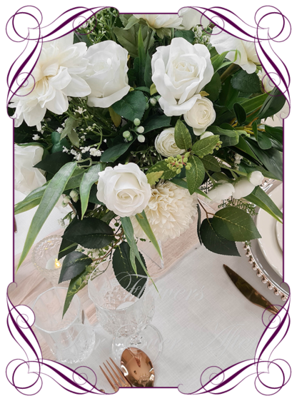 Silk faux ivory, white table centrepiece decoration flowers. Wedding table florals. Shower table decorations. Realistic romantic wedding table centrepiece with roses, dahlia, gum leaves, ranunculus, baby's breath, and foliage. Affordable table decoration flowers. Made in Australia. Buy online. Shipping world wide.