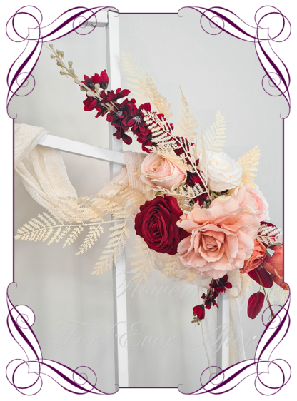 Silk Wedding Ceremony Arbor flowers featuring artificial blush pink, peach, cream, and red. Luxe wedding arbor decoration florals, romantic elegant and unusual bridal style modern luxe wedding decorations. Made in Melbourne by Australia's Best Artificial Bridal Florist. Buy online Now. Worldwide Shipping available