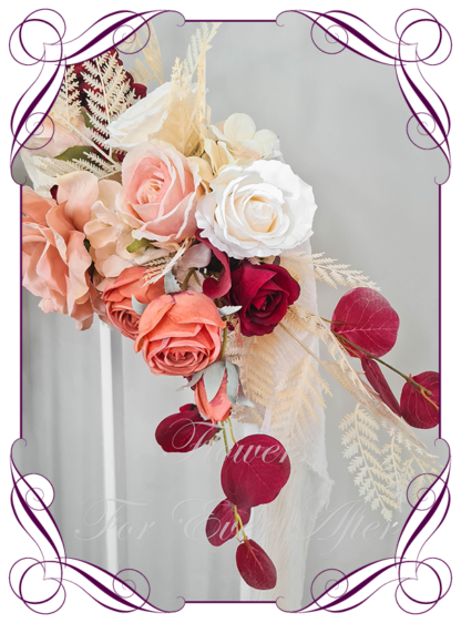 Silk Wedding Ceremony Arbor flowers featuring artificial blush pink, peach, cream, and red. Luxe wedding arbor decoration florals, romantic elegant and unusual bridal style modern luxe wedding decorations. Made in Melbourne by Australia's Best Artificial Bridal Florist. Buy online Now. Worldwide Shipping available