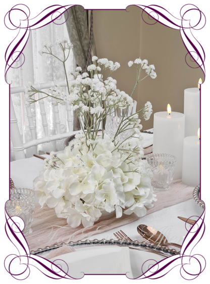 Silk faux ivory, white table centrepiece decoration flowers. Wedding table florals. Shower table decorations. Luxe romantic wedding table centrepiece with roses, babys's breath, hydrangea. Affordable table decoration flowers. Made in Australia. Buy online. Shipping world wide.