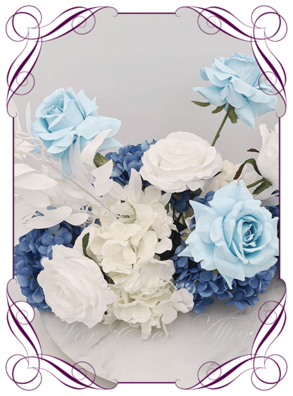 Silk artificial sapphire blue and white table centrepiece decoration flowers. Wedding table florals. Shower table decorations. Luxe rustic romantic wedding table centrepiece with roses, and hydrangea. Affordable table decoration flowers. Made in Australia. Buy online. Shipping world wide.