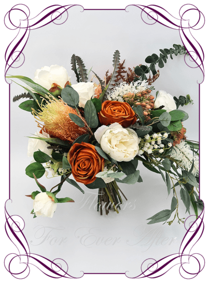 Silk Bridal Bouquet in realistic rust burnt orange, green leaves, and ivory, native faux flowers. Bridal posy, featuring artificial roses, bottle brush, banksia, peony, lily of the valley flowers in a romantic rustic and unusual bridal style modern rustic wedding bouquets. Made in Melbourne by Australia's Best Artificial Bridal Florist. Buy online now. Worldwide Shipping available