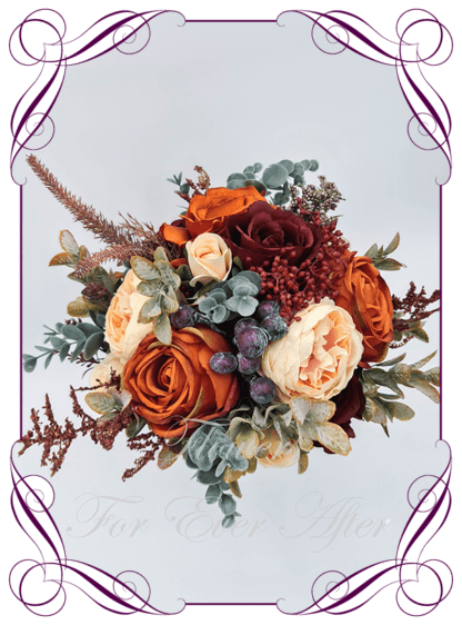 Silk Bridesmaid Bouquet in realistic burgundy, rust burnt orange, peach and cream faux flowers. Bridal posy, featuring artificial roses, ranunculus, berries, eucalypt, flowers in a romantic elegant and unusual bridal style modern rustic wedding bouquets. Made in Melbourne by Australia's Best Artificial Bridal Florist. Buy online now. Worldwide Shipping available