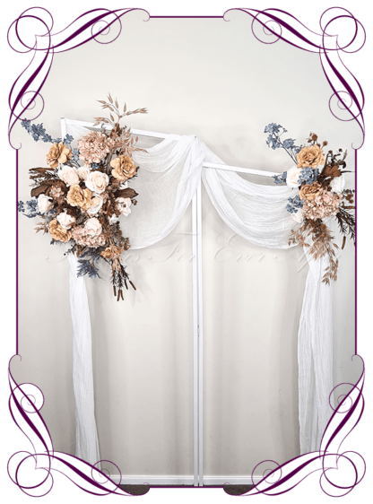 Silk artificial wedding arbor florals in an artistic renaissance colour theme. Realistic blush, peach, dusty blue, dusty pink, mustard toffee gold, brown, and cream faux flowers. Ceremony flowers, featuring artificial roses, hydrangea, peonies, wild flowers in a romantic elegant and unusual bridal style modern rustic ceremony arrangement. Made in Melbourne by Australia's Best Artificial Bridal Florist. Buy online now. Worldwide Shipping available