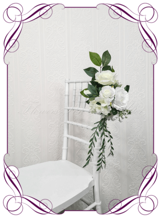 Wedding Ceremony Silk chair pew flowers. Artificial simple classic white and green pew florals decoration, for wedding ceremony backdrop decoration. Roses, hydrangea, baby's breath. Buy online now. Shipping world wide. Cheap wedding pew chair decoration ideas.