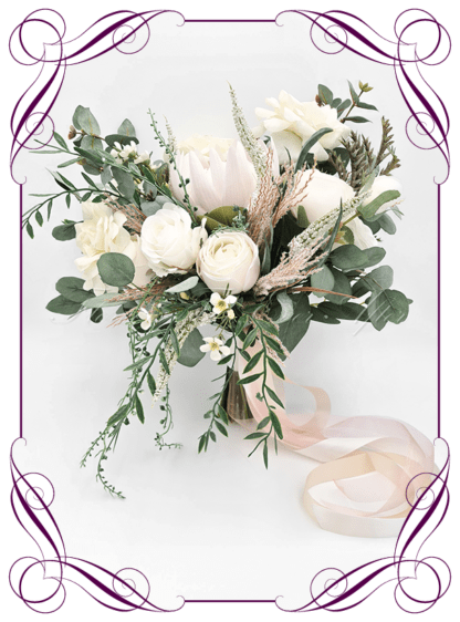 Elegant rustic silk artificial white king protea, pampas, roses and Australian native bridal bouquet wedding flowers. Romantic wedding. Navy wedding. Dusty pink wedding. Blush pink wedding. Mauve wedding. Realistic silk flowers, whimsical rustic style posy. Made in Melbourne. Shipping world wide, buy online.