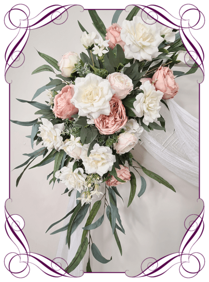 Wedding Ceremony Silk arbor flowers. Artificial blush pink, white and native eucalypt gum arbor florals decoration, for wedding ceremony backdrop decoration. Peony, roses and Australian native gum foliage. Buy online now. Shipping world wide. Cheap wedding arbor decoration ideas.