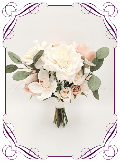 Artificial Bridesmaids flowers in faux blush pink, and white roses with gum natives. Silk Bridesmaids Bouquet posy, featuring faux flowers Australian native sage green gum leaves in a romantic elegant and unusual bridal style, classic white and blush pink wedding flowers, native rustic wedding, boho flowers, traditional wedding bouquets. Made in Melbourne by Australia's Best Artificial Bridal Florist. Buy now Online. Worldwide Shipping available