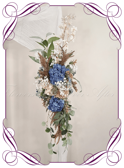 Wedding Ceremony Silk arbor flowers. Artificial blue, latte brown, white, and sage green arbor florals decoration, for wedding ceremony backdrop decoration. Hydrangea, blossom, rustic seed pods, baby's breath, native gum eucalypt foliage. Buy online now. Shipping world wide. Cheap wedding arbor decoration ideas.