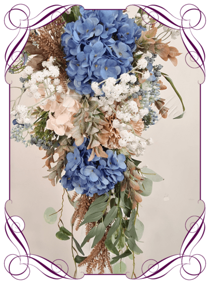Wedding Ceremony Silk arbor flowers. Artificial blue, latte brown, white, and sage green arbor florals decoration, for wedding ceremony backdrop decoration. Hydrangea, blossom, rustic seed pods, baby's breath, native gum eucalypt foliage. Buy online now. Shipping world wide. Cheap wedding arbor decoration ideas.