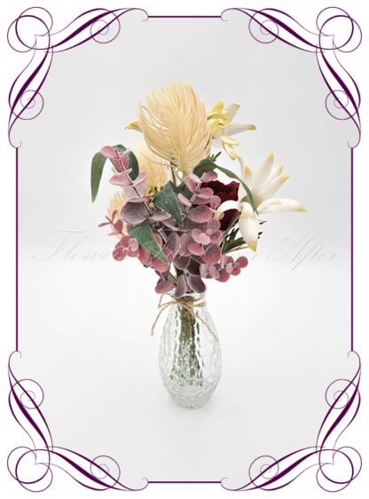 Silk faux burgundy and cream table centrepiece decoration flowers. Wedding table florals. Shower table decorations. Luxe rustic romantic wedding table centrepiece with rose, Australian natives, and eucalypt. Cheap wedding table decoration flowers. Made in Australia. Buy online. Shipping world wide.