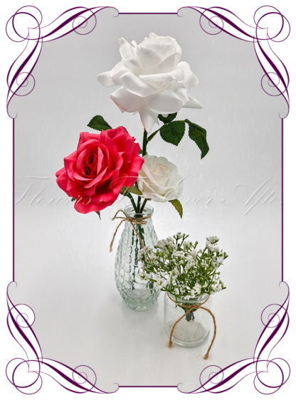 Silk faux white and hot pink table centrepiece decoration flowers. Wedding table florals. Shower table decorations. Luxe rustic romantic wedding table centrepiece with roses . Cheap wedding table decoration flowers. Made in Australia. Buy online. Shipping world wide.
