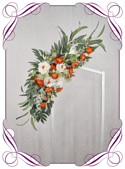 Wedding Ceremony Silk arbor flowers. Artificial rust burnt orange, white, and sage and blue green arbor florals decoration, for wedding ceremony backdrop decoration. Hydrangea, roses, peonies, native gum eucalypt foliage. Buy online now. Shipping world wide. Cheap wedding arbor decoration ideas.