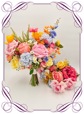 Artificial Bridal flowers in bright vibrant yellow, fuchsia pink, coral, orange, pastel, and blue luxe flowers. Silk wedding Bouquet posy, featuring faux flowers in a romantic elegant and unusual bridal style, modern luxe flowers, romantic spring style garden wedding bouquets. Made in Melbourne by Australia's Best Artificial Bridal Florist. Buy now Online. Worldwide Shipping available