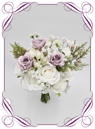 Artificial Bridal flowers in white , blush, and lavender purple. Silk wedding Bouquet posy, featuring faux flowers in a romantic elegant and unusual bridal style, classic white and traditional wedding bouquets. Made in Melbourne by Australia's Best Artificial Bridal Florist. Buy now Online. Worldwide Shipping available