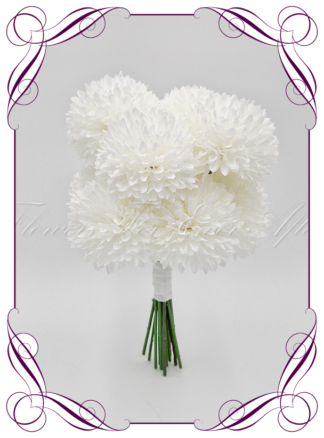 Artificial Bridal flowers in white pom pom dahlia, fluffy balls. Silk wedding Bouquet posy, featuring faux flowers in a romantic elegant and unusual bridal style, classic white and traditional wedding bouquets. Made in Melbourne by Australia's Best Artificial Bridal Florist. Buy now Online. Worldwide Shipping available
