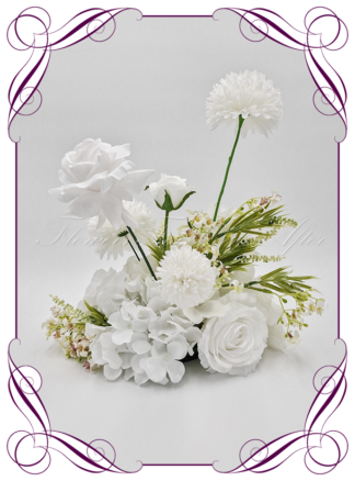 Silk faux ivory, white, table centrepiece decoration flowers. Wedding table florals. Shower table decorations. Luxe romantic wedding table centrepiece with roses, pom poms, wildflowers, hydrangea. Cheap table decoration flowers. Made in Australia. Buy online. Shipping world wide.