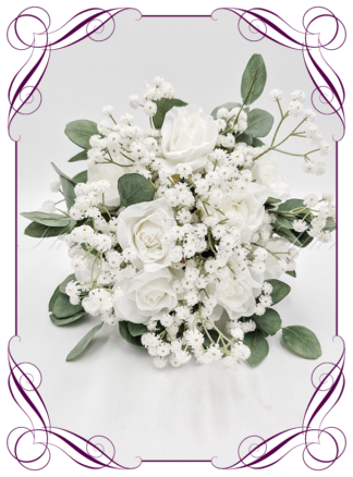 Artificial Bridal flowers in white roses, foliage, and baby's breath. Silk wedding Bouquet posy, featuring faux flowers in a romantic elegant and unusual bridal style, classic white and traditional wedding bouquets. Made in Melbourne by Australia's Best Artificial Bridal Florist. Buy now Online. Worldwide Shipping available