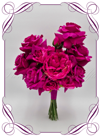 Artificial Bridal flowers in bright vibrant magenta, fuchsia pink, and red luxe flowers. Silk wedding Bouquet posy, featuring faux flowers in a romantic elegant and unusual bridal style, modern luxe flowers, romantic wedding bouquets. Made in Melbourne by Australia's Best Artificial Bridal Florist. Buy now Online. Worldwide Shipping available